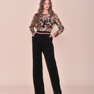 Conjunto pantalón fiesta negro con top de transparencias con detalles florales